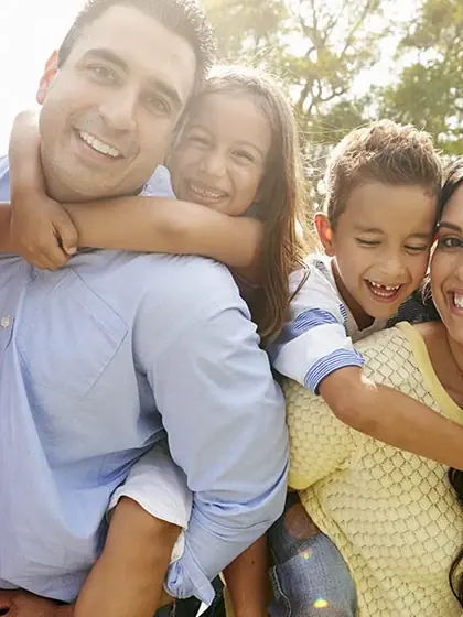 A family of three generations together outdoors in East Greenwich, Rhode Island.